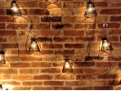 KONSTSMIDE LED-Biergarten-Lichterkette mit 10 schwarzen Lampenschirmen, Basis-Set 9,15 m, bernsteinfarben, klassisch warmweiß