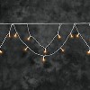 KONSTSMIDE LED-Dachrinnenkette 200 LED bernsteinfarben, klassisch warmwei