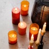 LUMINEO LED-Echtwachs-Kerzen im Glas Mandarinen-Orange 3er-Set, Hhe 12,5 cm, 15 cm, 17,5 cm, warmweie Flacker-LED, Batteriebetrieben,  Timer